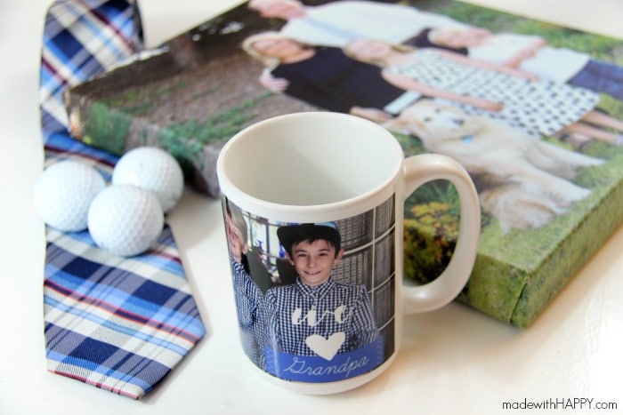 A customisable mug and a printed canvas on a table 