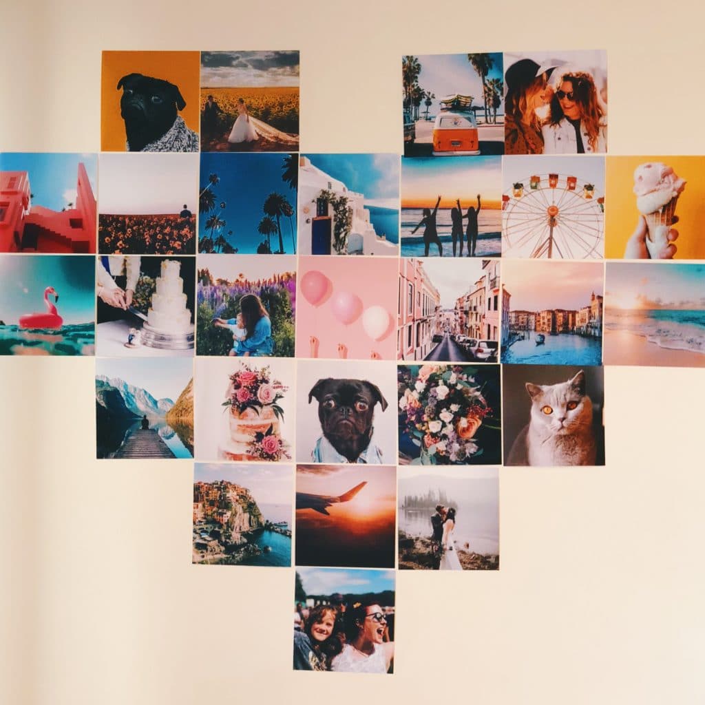 Create a gallery wall of prints grouped into a heart shape