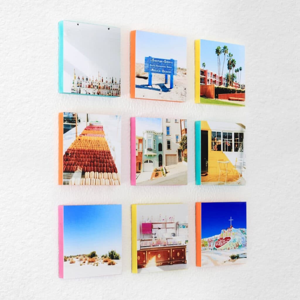 A set of colourful photo wall blocks hanging on a wall