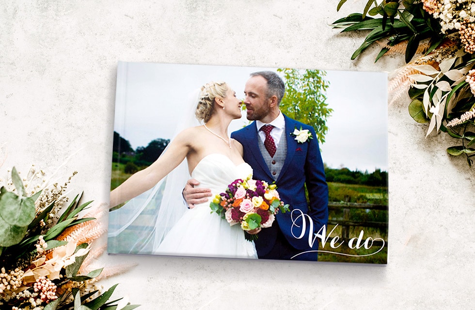 Create a photo scrapbook with wedding photo books