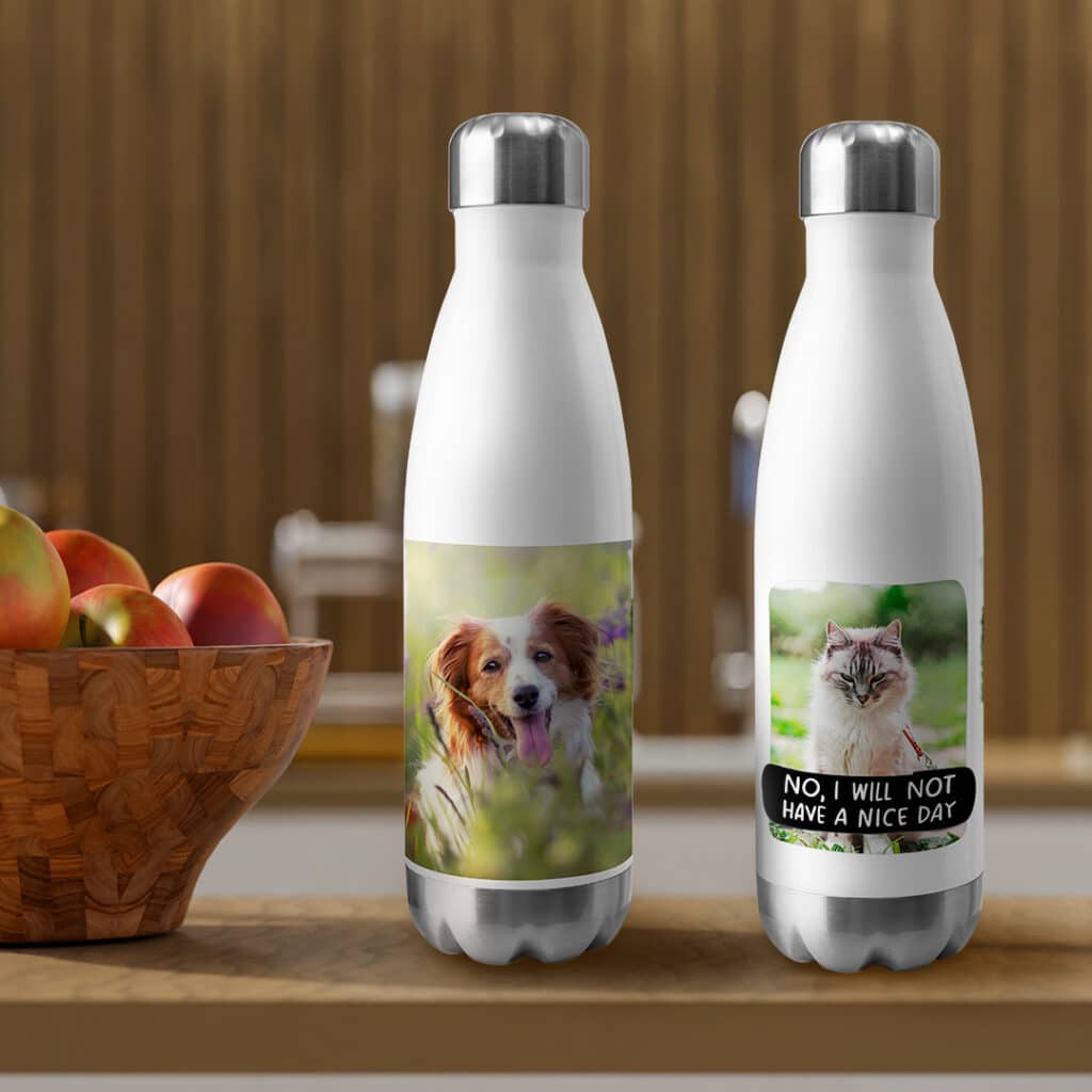 A pair of water bottles with pet imagery printed on