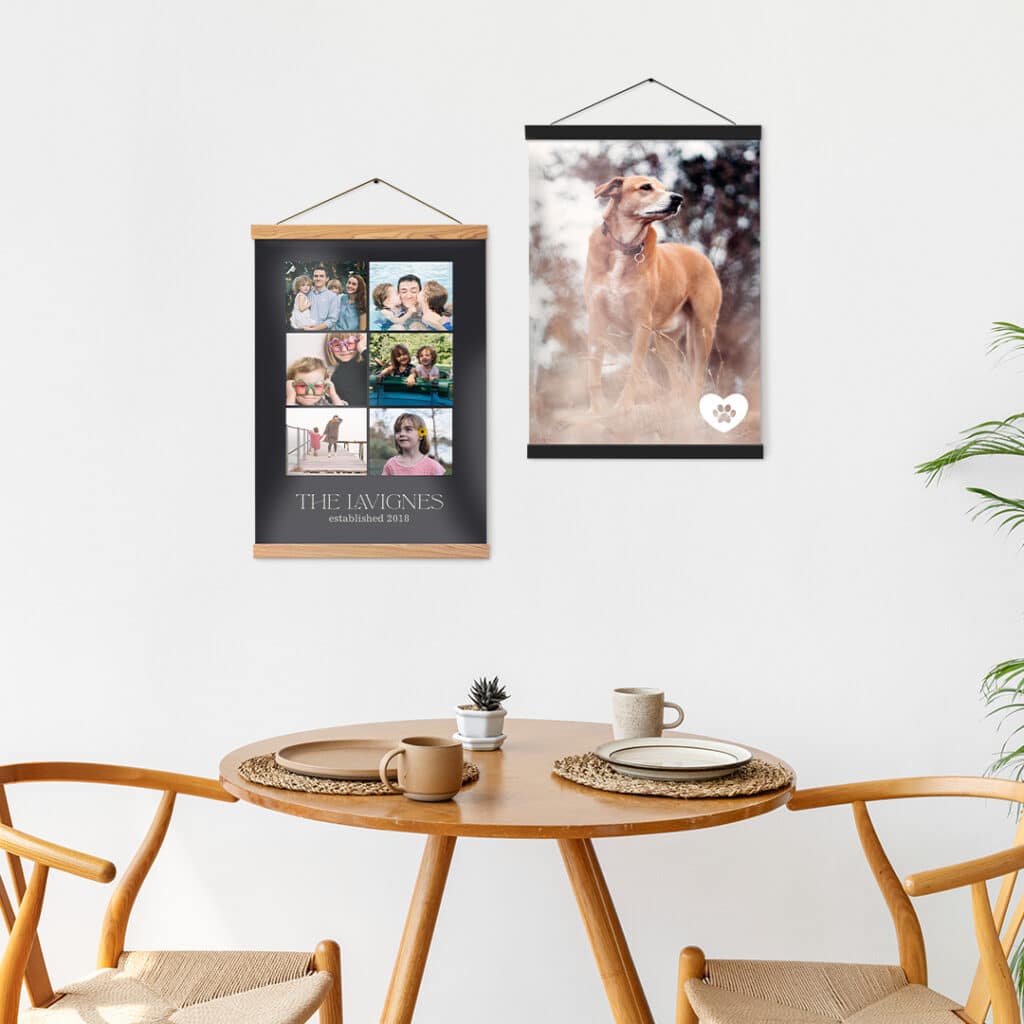 Framed Hanging Posters on a wall in front of a small table