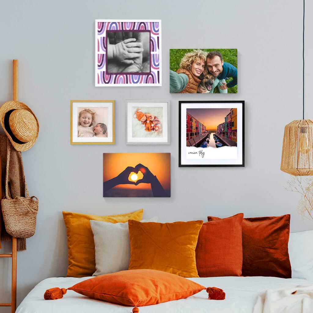 Photo tiles displayed on a wall in a living room environment