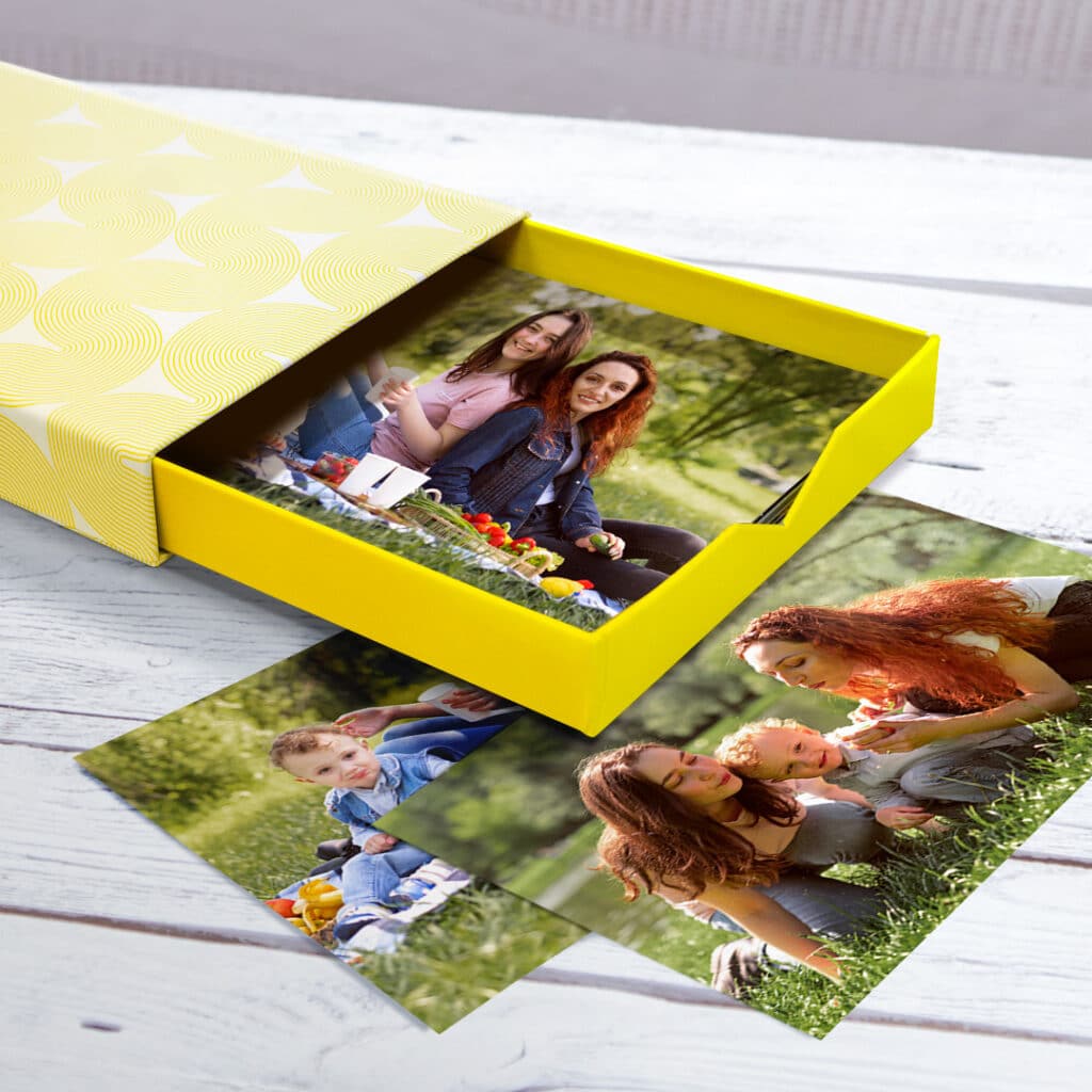 Photo Box on a table with prints